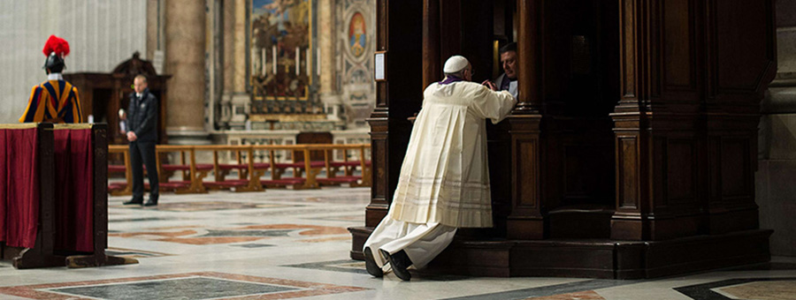 A clergyman hears confession from Pope Francis during a penitential liturgy in St. Peter's Basilica at the Vatican March 28. Pope Francis surprised his liturgical adviser by going to confession during the service. (CNS photo/L'Osservatore Romano via Reuters) (March 31, 2014) See POPE-PENANCE March 28, 2014.