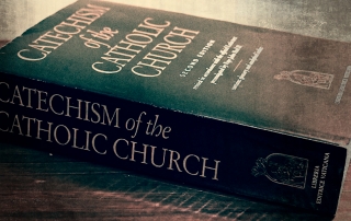 image of the catechism of the catholic church lying on its side